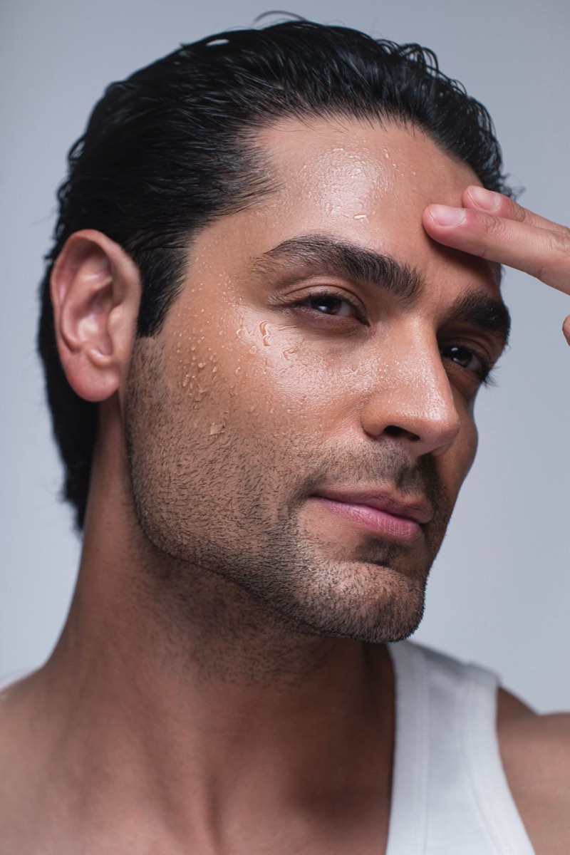 Man going through his morning Skin Coffee routine